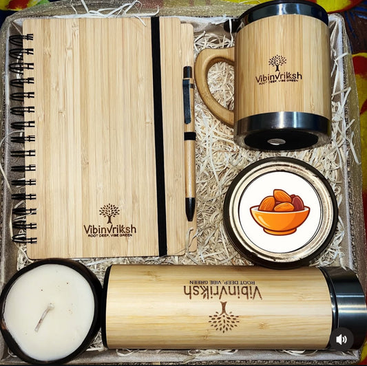 Eco-Luxury Gift Hamper – Bamboo Flask, Mug, Diary, Coconut Shell Candle & Dry Fruits Jar